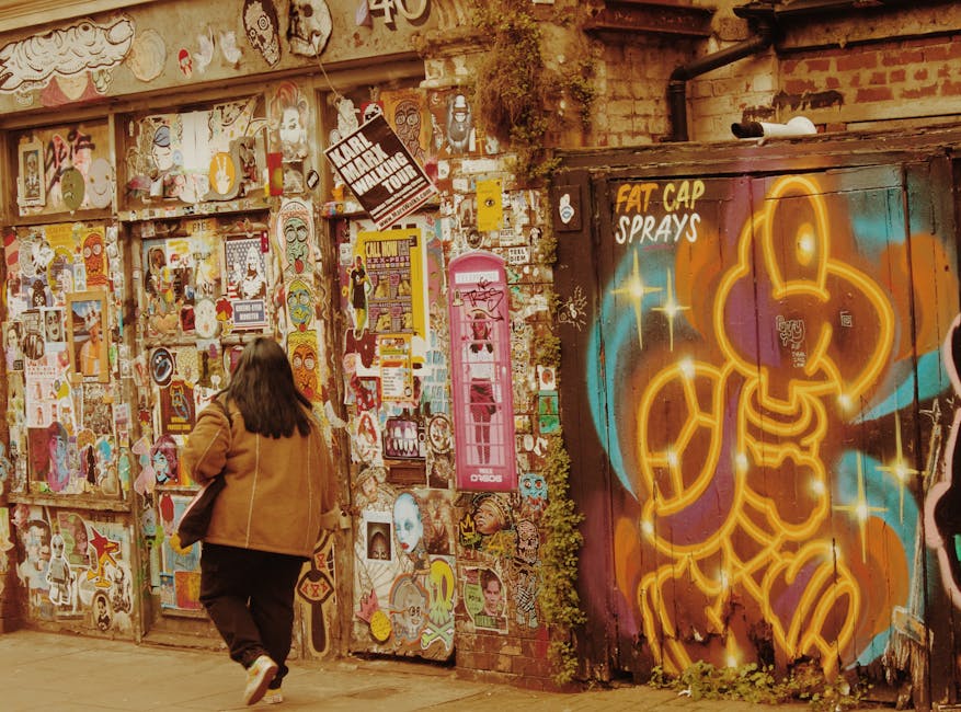 Urban skyline at dusk with colorful graffiti art and soft lighting.