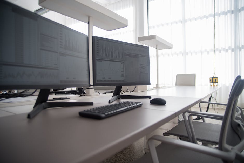 A modern office with technology and collaborative workspaces.