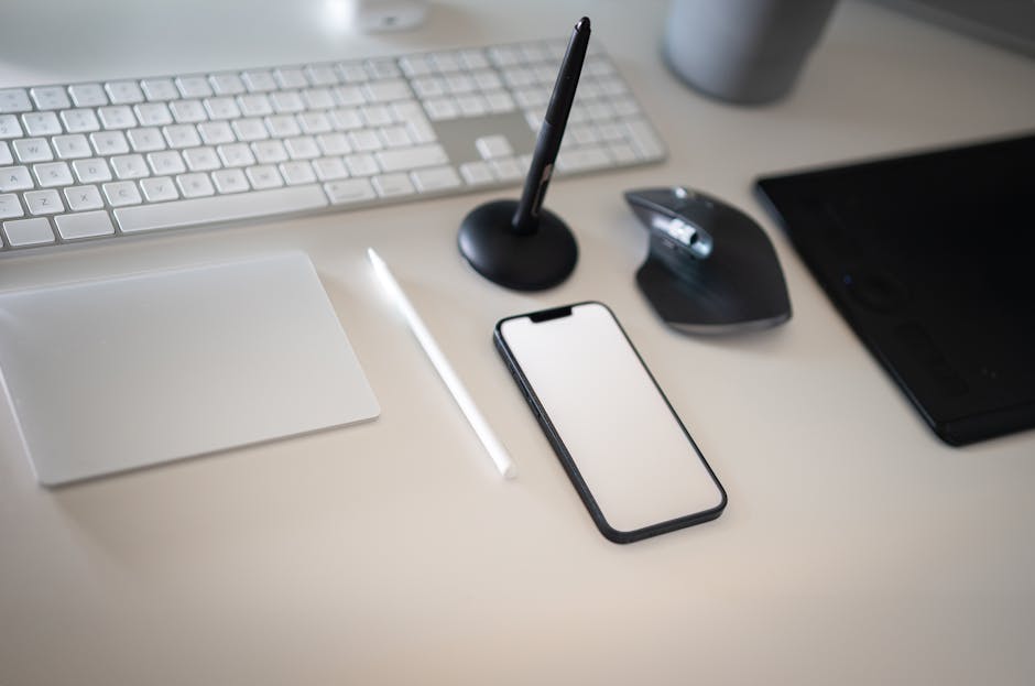 A smartphone and digital currency coins on a clean desk