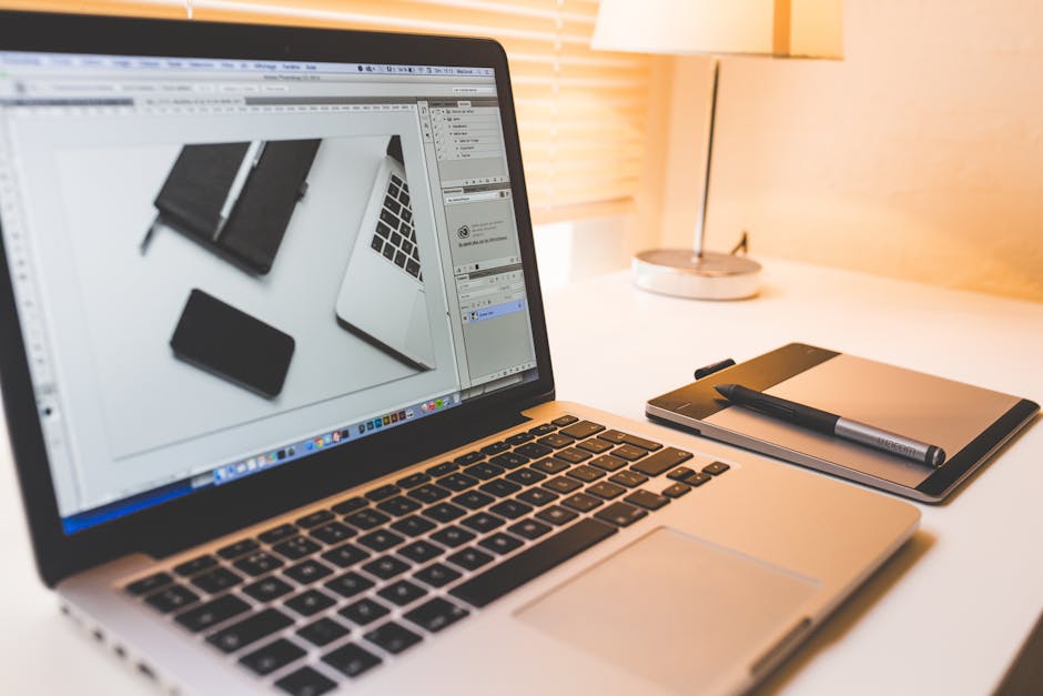 A creative workspace with tech tools and brainstorming materials.