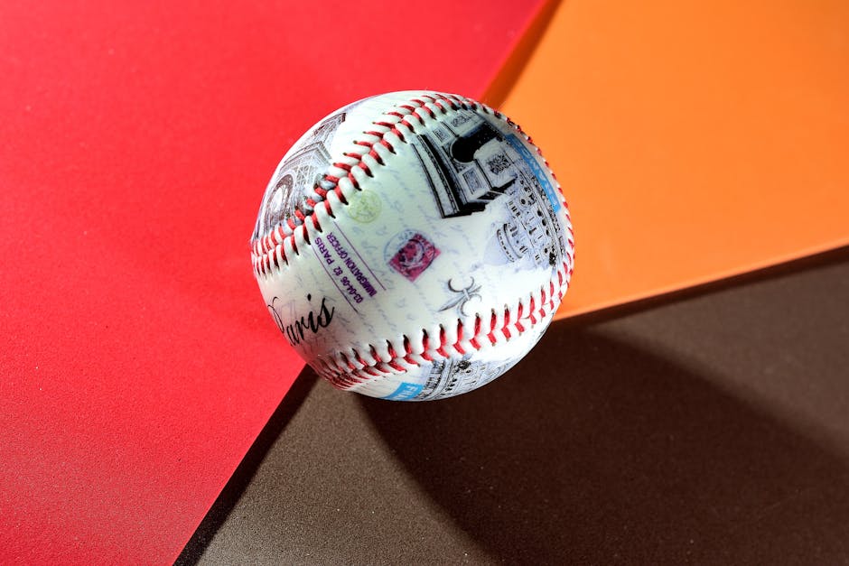 A colorful baseball field with playful illustrations of baseball equipment.