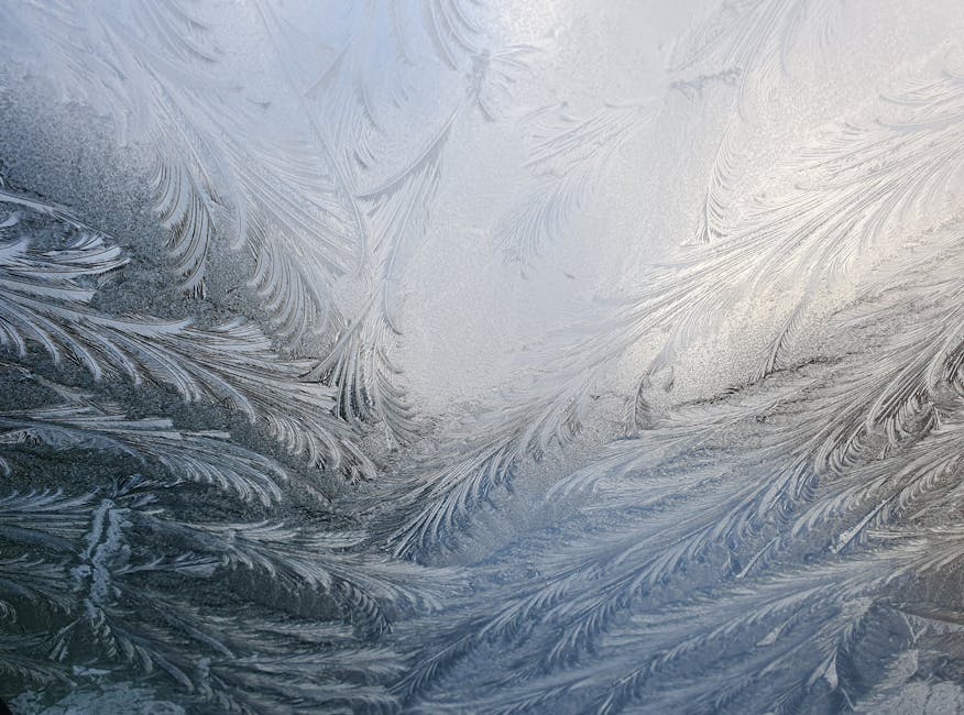 Icy landscape with crystalline structures and shimmering frost.