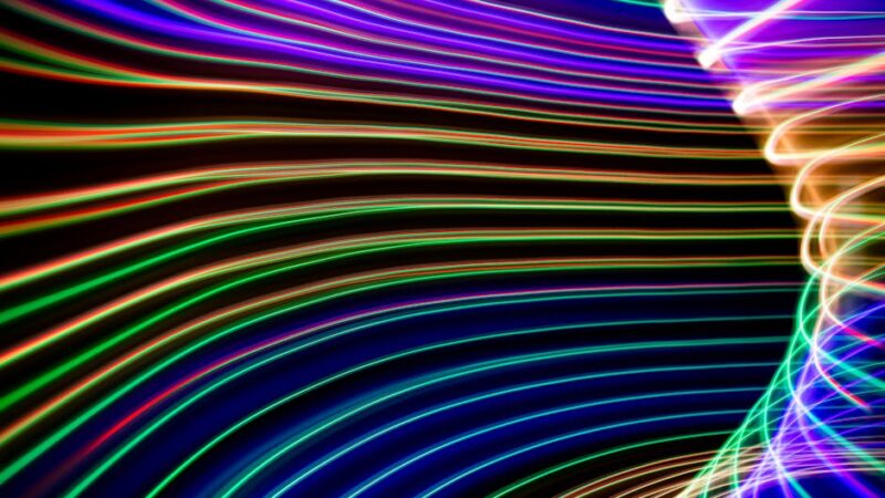 An abstract digital landscape with flowing shapes and colors.