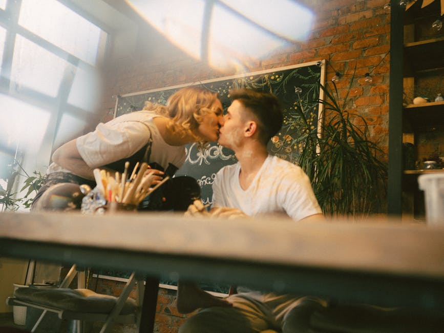 Couple enjoying a shared hobby in a warm, inviting space.
