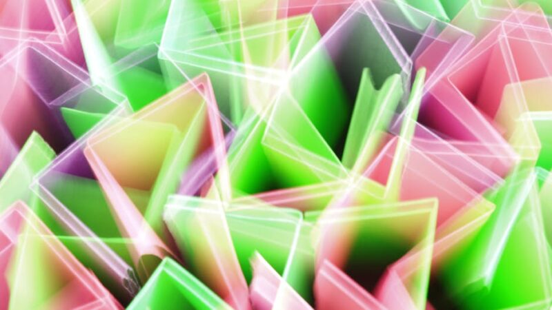 Abstract geometric shapes in vibrant colors representing cryptocurrency dynamics.