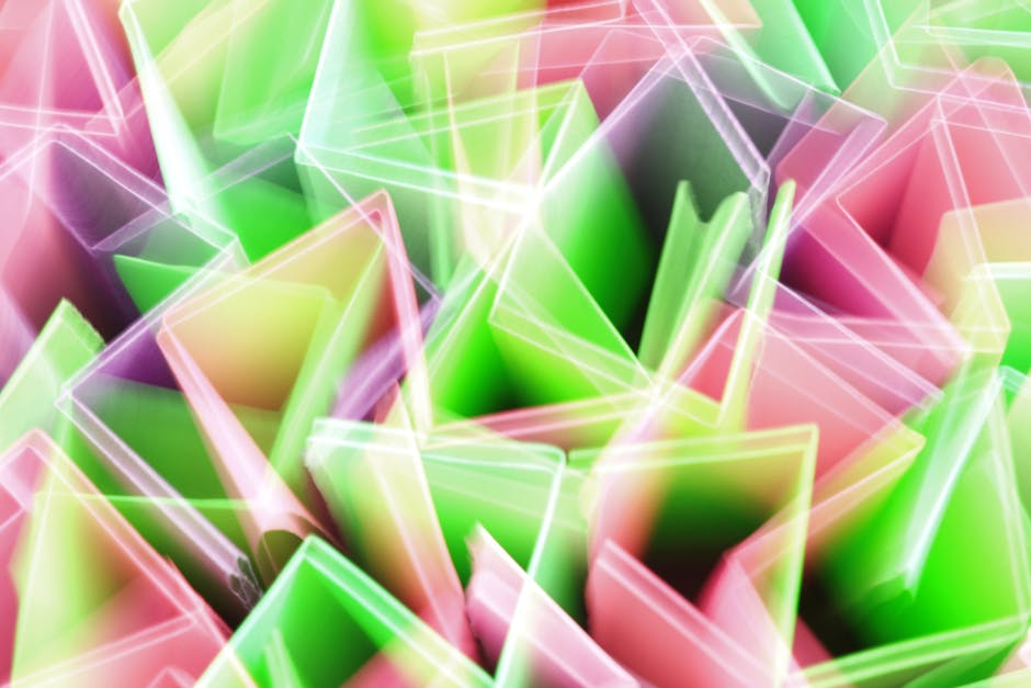 Abstract geometric shapes in vibrant colors representing cryptocurrency dynamics.