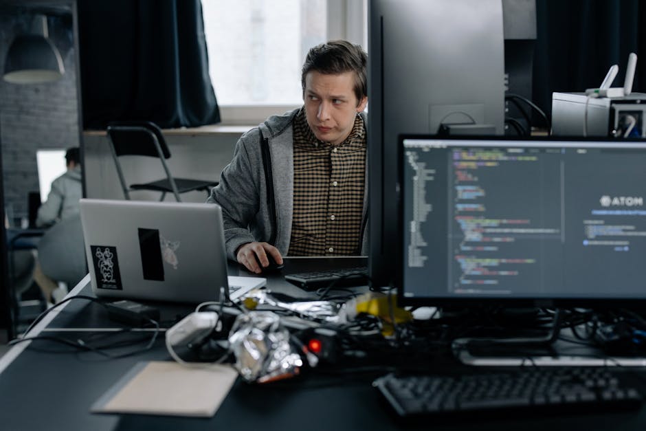 A modern office with high-tech gadgets and data analytics displays.