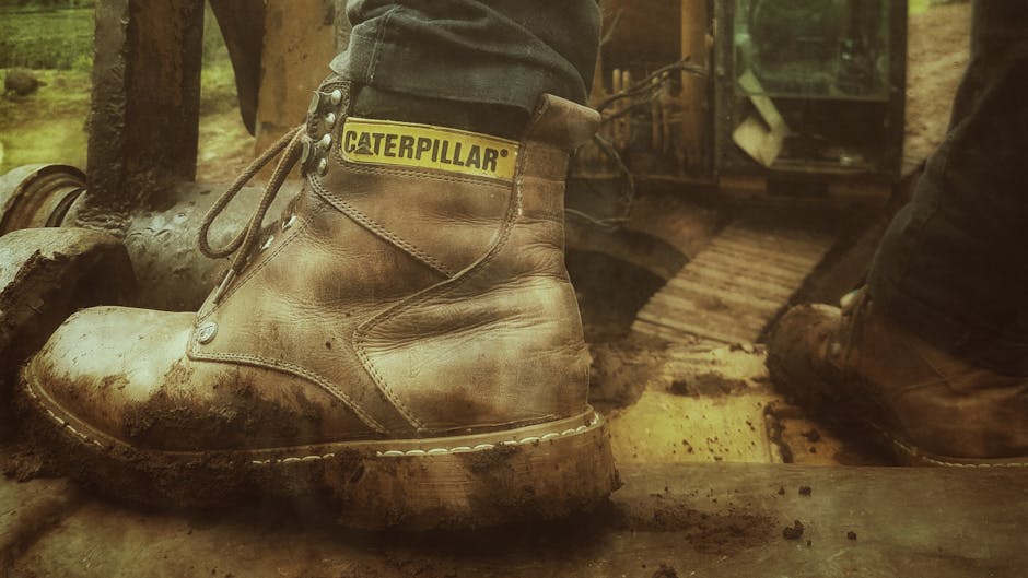 A rugged terrain with durable machinery operating in natural surroundings.