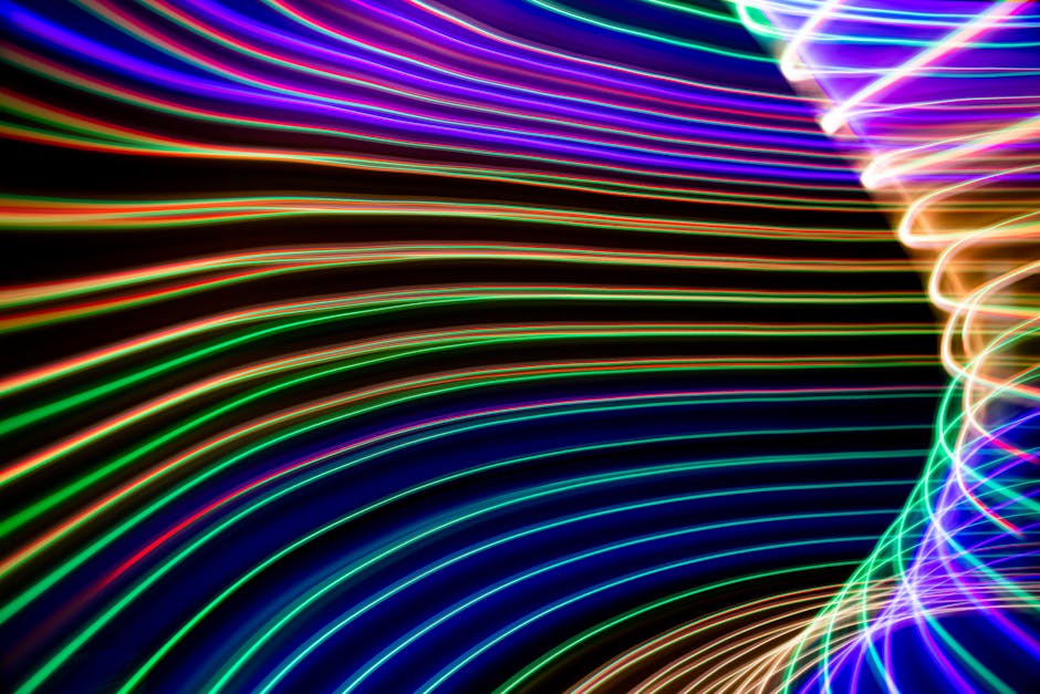 Abstract digital landscape with flowing shapes and vibrant colors.