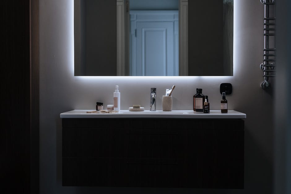 A modern vanity setup with soft lighting and beauty products.