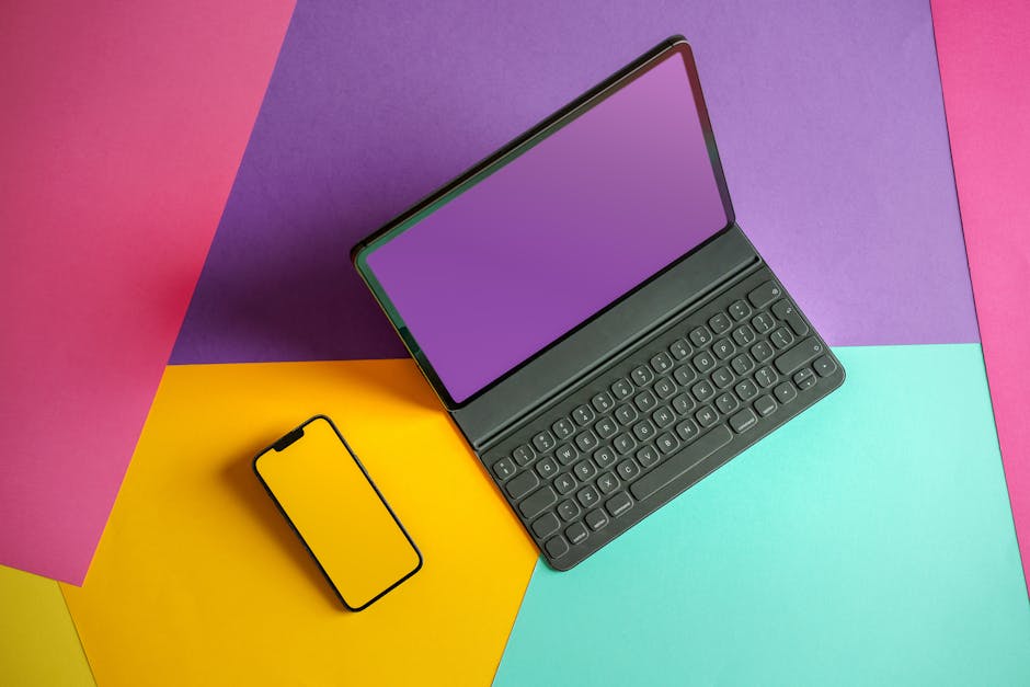 A modern workspace with devices and subtle cryptocurrency symbols.