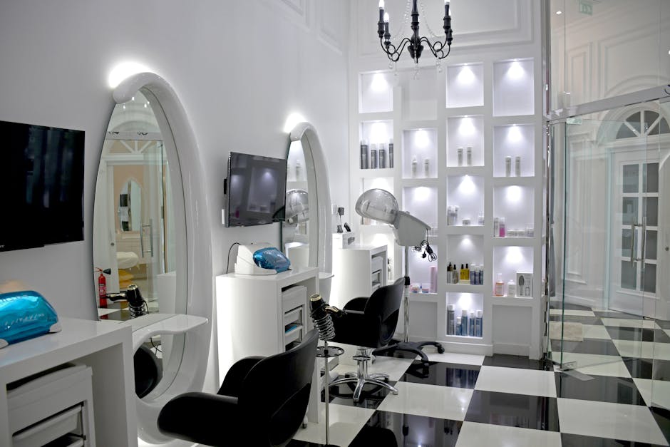 Interior of a modern hair salon with styling stations and hair products.